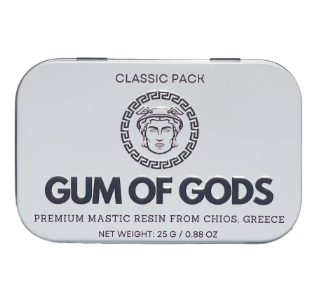 Rectangular tin labeled 'Gum of Gods,' premium mastic resin from Chios, Greece.