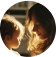 A woman and child share a tender moment in soft focus lighting.