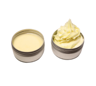 Two small tins, one with cream and one with whipped body butter.