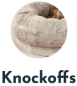Circular image of a fluffy gray cushion with the word 'Knockoffs' below it.