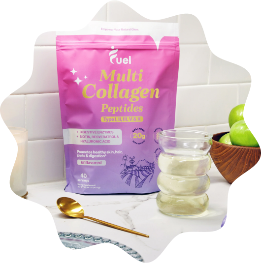 Packet of fuel Multi Collagen Peptides on a counter with a gold spoon and glass.