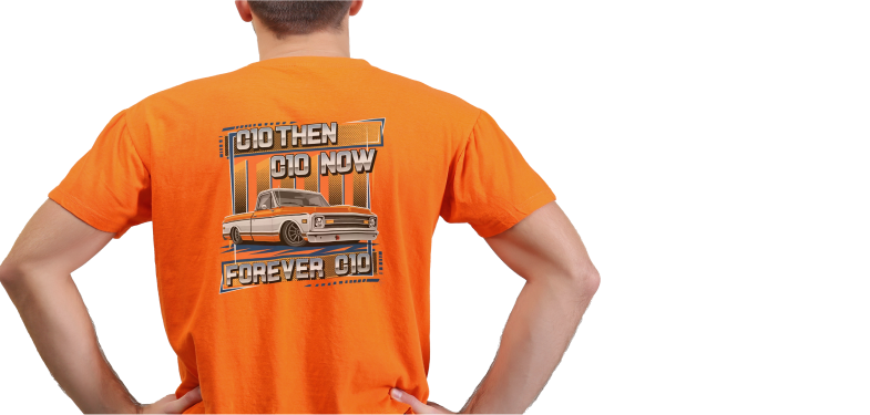 Man wearing an orange T-shirt with a vintage truck design and text.