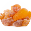 Pieces of amber-colored resin in a small pile.