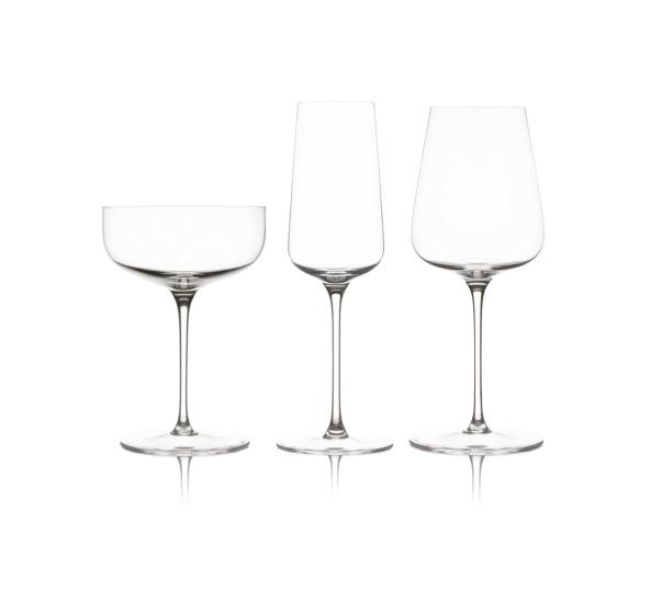 Three empty wine glasses on a white background.