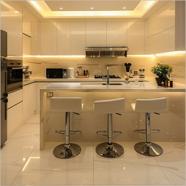 Modern kitchen with a sleek design, featuring a white island and three bar stools.
