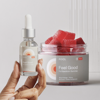 Bottle and jar of FOCL Feel Good full spectrum gummies and drops.