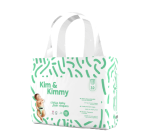 Pack of Kim & Kimmy Ultra Baby Diapers with green patterns and a baby image.