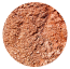 A mound of reddish-brown spice powder.