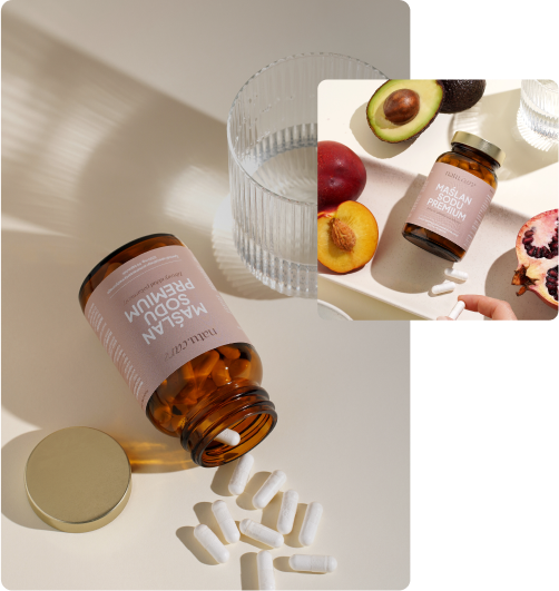 A bottle of dietary supplements with fruits and a glass of water in the background.
