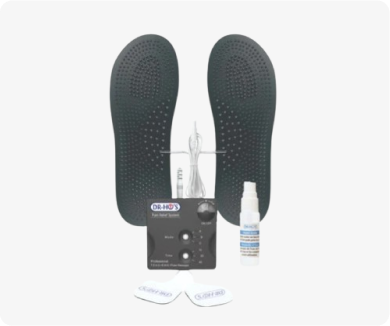 Dr. Ho's foot pain relief system with insoles, a control unit, and a spray bottle.